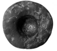 DAL-3002 - Dé à alvéolesfer, bronzeBloc épais de forme circulaire, dont une face est creusée d'1 à 5 alvéoles à fond arrondi, de diamètre et de profondeur variable (0,7 à 1,4 cm).