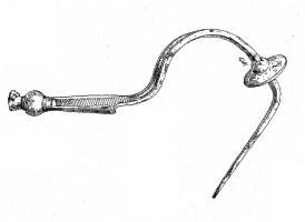 FIB-2636 - Fibule à disque d'arrêtbronzeFibule à arc plat, en segment de cercle, séparé de l'ardillon (sans ressort) par un disque d'arrêt transversal; pied allongé avec porte-ardillon en gouttière, bouton mouluré ou vasiforme à l'extrémité du pied.