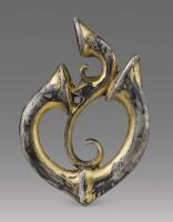FIB-41772 - Fibule à trompettesargent doréFibule constituée d'un assemblage de motifs en trompette séparés par des ajours.
