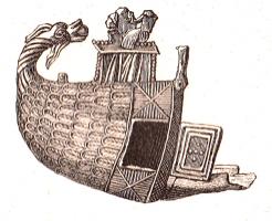 SFP-9001 - Sifflet de pèlerin : ND de BoulogneplombSifflet en forme de demi-navire, dont la poupe est recourbée en tête de dragon. Sur le pond, Vierge assise tenant l'Enfant-Jésus. Une porte s'ouvre dans le flanc du navire, qui semble couvert d'écailles.