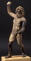 STE-4317 - Statuette : Zeus - JupiterbronzeStatue ou statuette en bronze représentant Zeus ou Jupiter, représenté sous la forme d'un homme d'âge mûr, barbu, nu ; le dieu brandit le foudre de la main droite élevée au-dessus de sa tête.