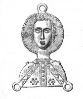ESP-7036 - Enseigne de pèlerinage : saint QuentinplombEnseigne en forme de buste de face, la tête entièrement détachée sur un nimbe; en habit de diacre, Quentin est figuré dans son martyre, les épaules transpercées de clous; trois anneaux de fixation au sommet et anx angles inférieurs.