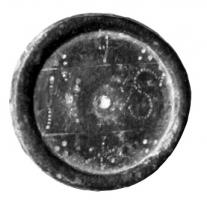 PDS-5046 - Poids circulaire : S N (6 nomismata)bronzeSimple plaque cylindrique épaisse, avec un rebord protégeant l'inscription de la valeur SN incisée ou ponctuée : 6 n(omismata).