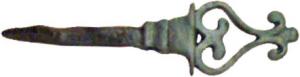 CLE-4059 - Clé à rotationbronze, ferClé en fer à manche en bronze coulé, en forme de fleuron symétrique sur une base moulurée de section carrée.