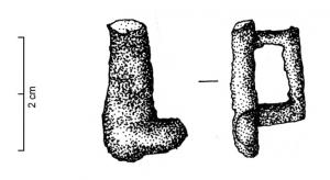 JHA-4024 - Passant de harnaisbronzePassant-applique  en forme de phallus au membre cannelé; au revers, bélière rectangulaire.